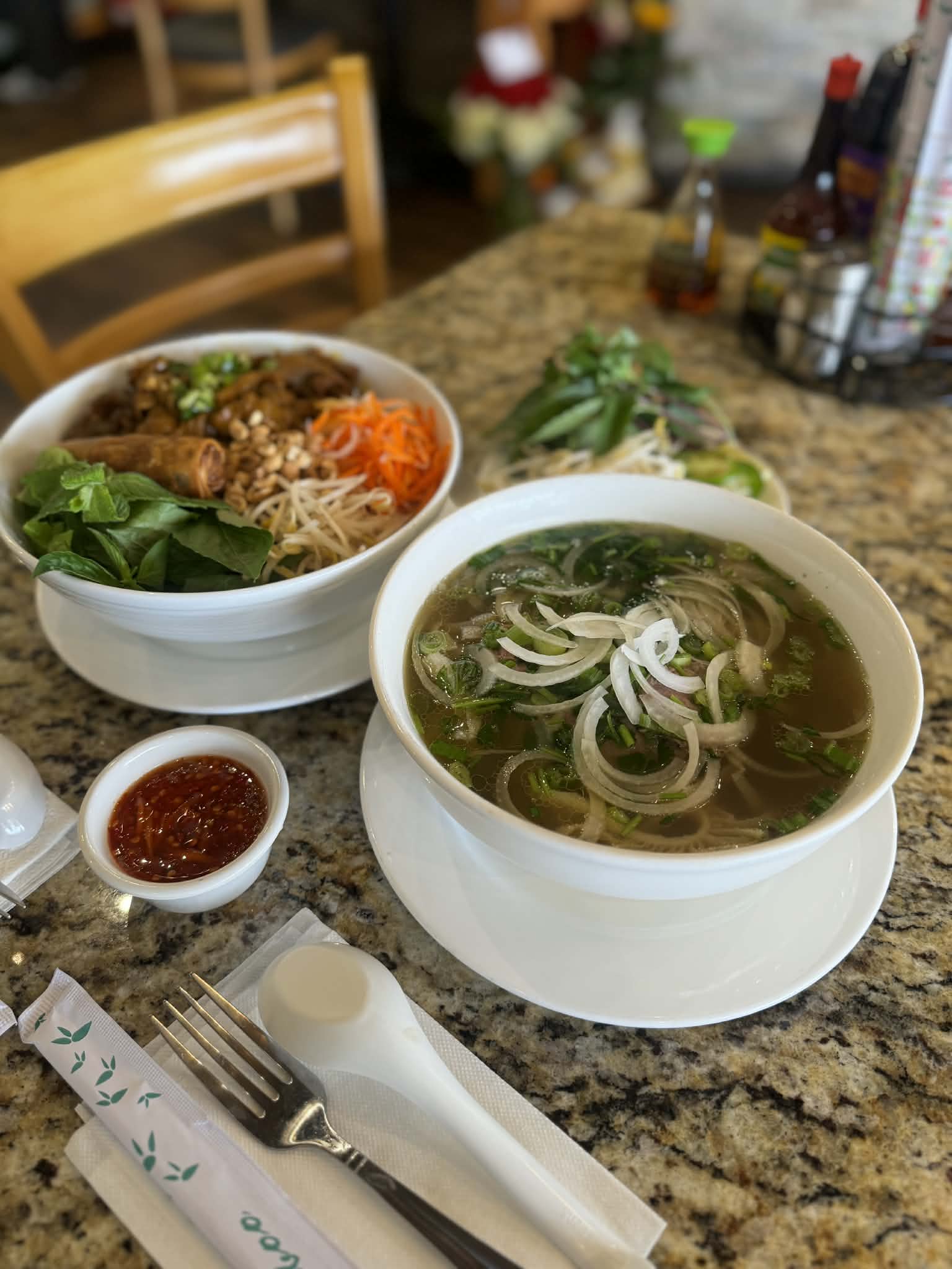 Close-up of a special bowl of pho with multiple toppings